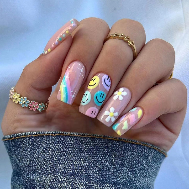 Artful Nail Art with Flower and Smiley Motifs Bowlift