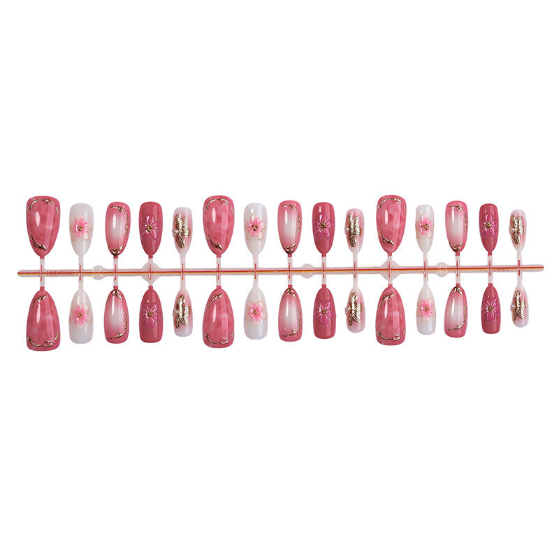 Artificial nail set with elegant flower and glitter details Bowlift