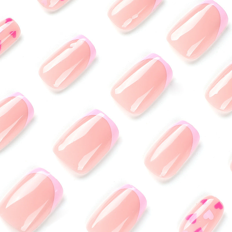Elegant Nail Art with Heart Motifs Bowlift