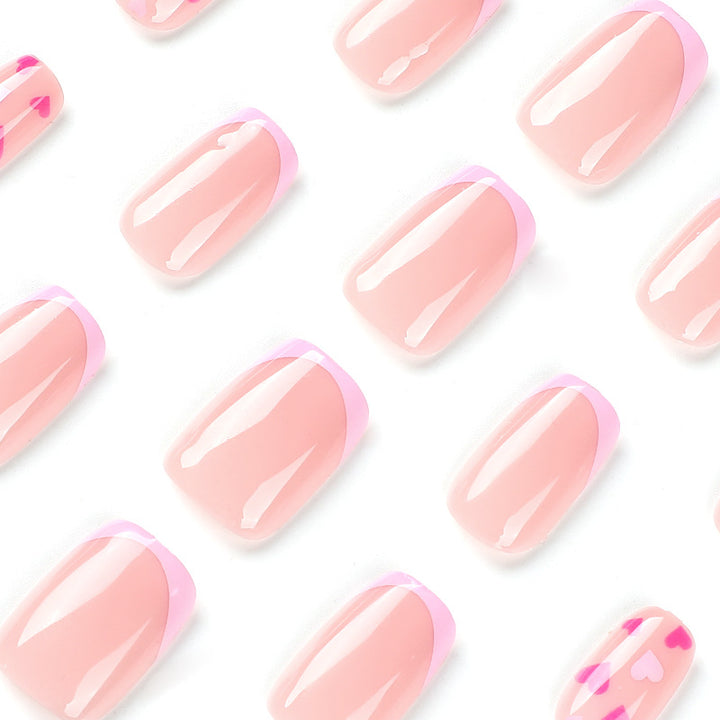 Elegant Nail Art with Heart Motifs Bowlift