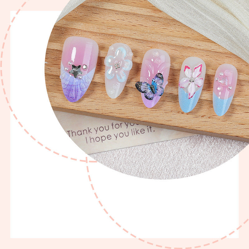 Creative nail art set with floral and butterfly motifs Bowlift
