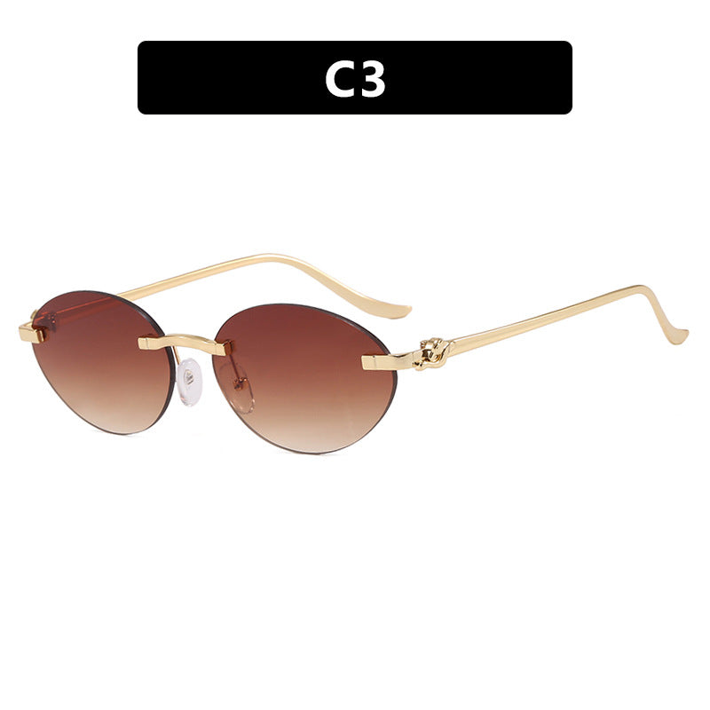 Women's elegant oval sunglasses with golden accents Bowlift