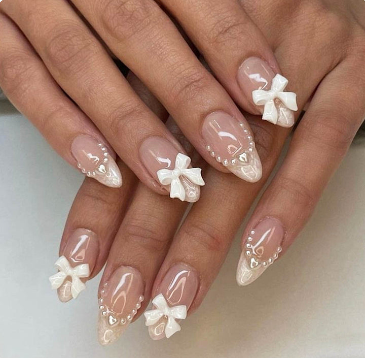 Elegant 3D Bow-Embellished Nail Art Extensions Bowlift