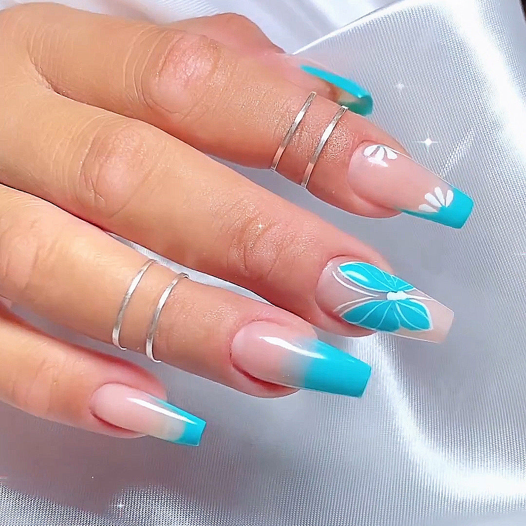 Artful nail art with ombre and flower decorations Bowlift