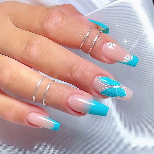 Artful nail art with ombre and flower decorations Bowlift