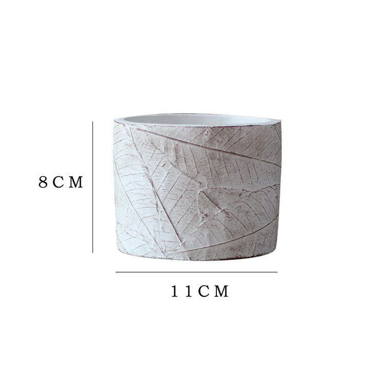 Decorative plant container made of handmade ceramic with leaf pattern Bowlift