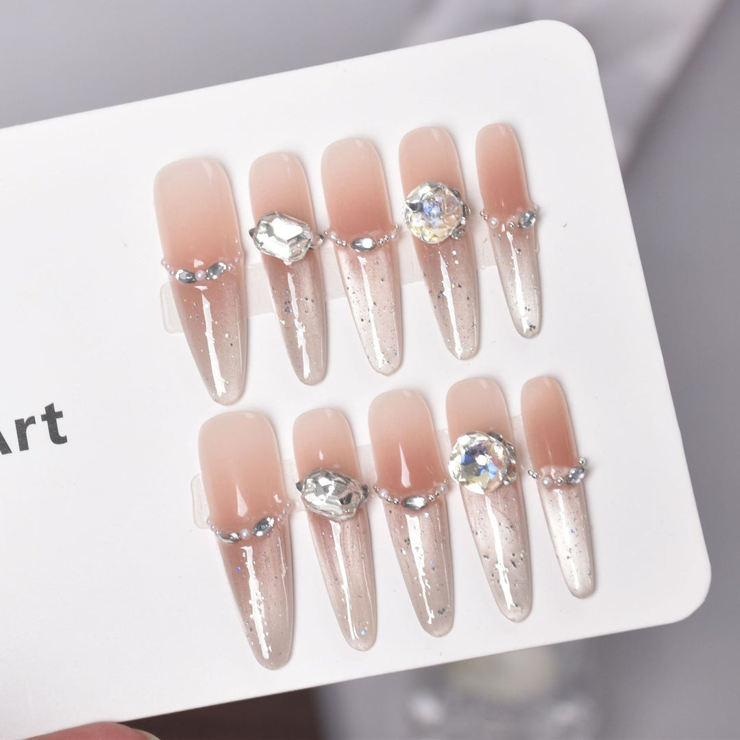 Artistic Stiletto Press-On Nail Art with Glimmering Accents Bowlift