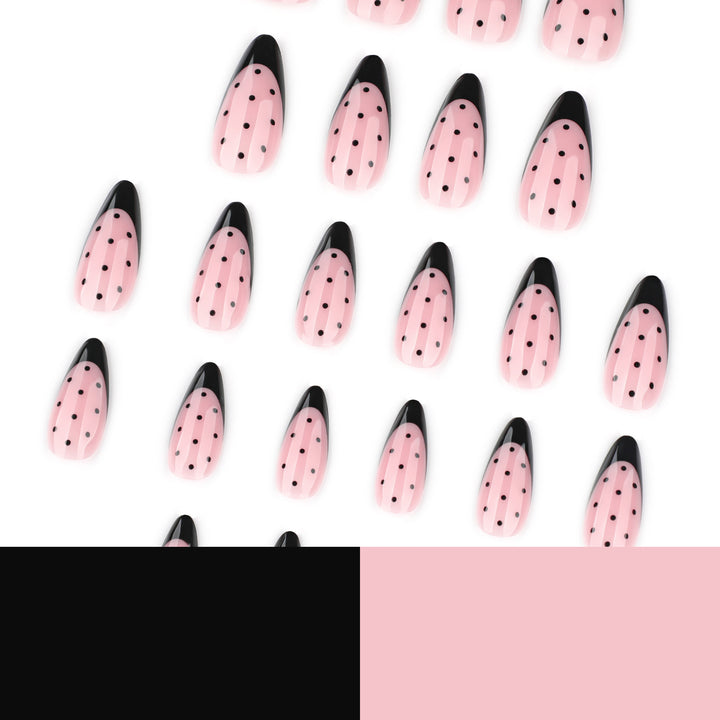 Artistic stiletto nails with black dot pattern Bowlift