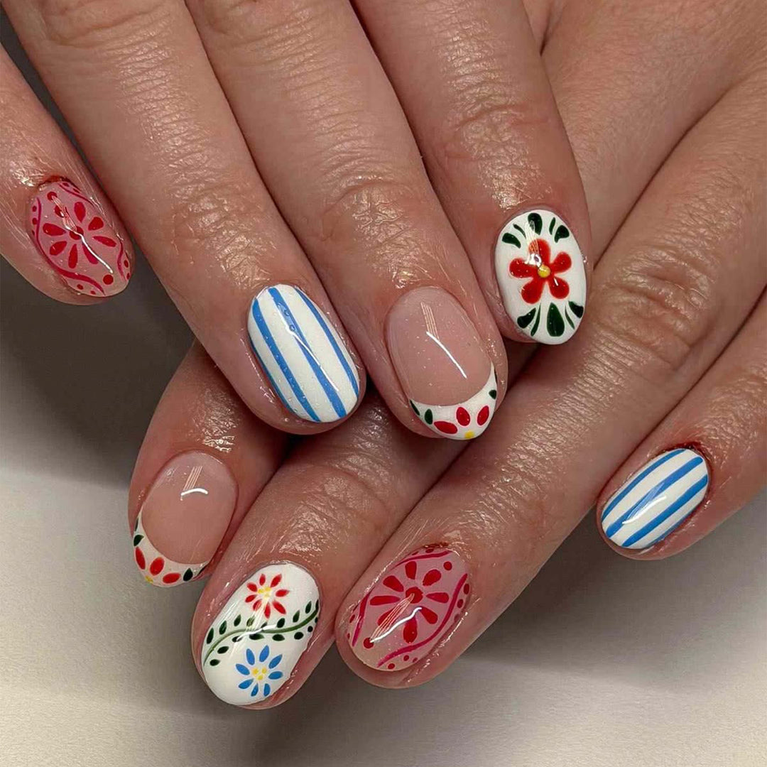 Artful nail art with floral design and colorful patterns Bowlift