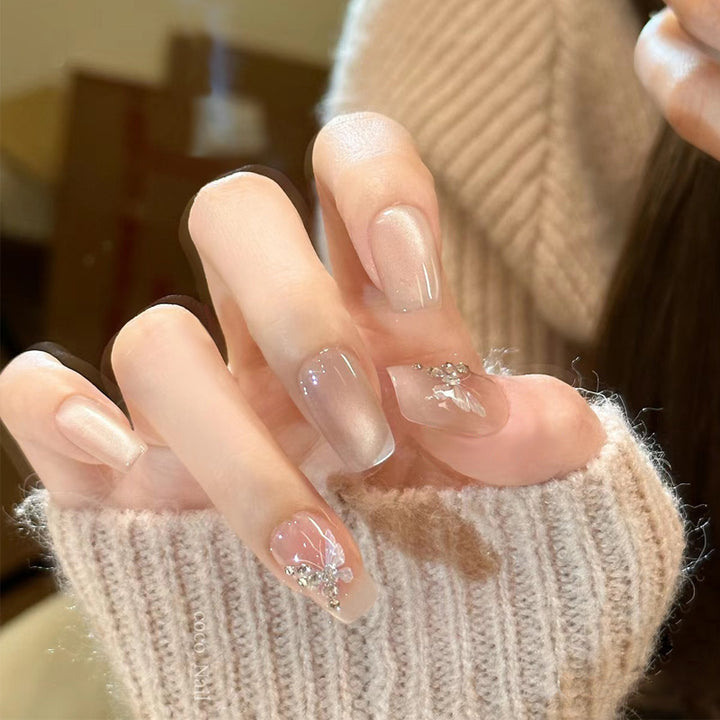 Elegant Faux French Tip Press-On Nails with Floral Accents Bowlift