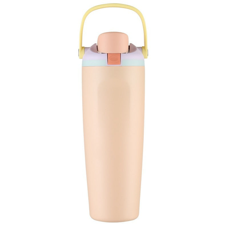 Unisex double-walled vacuum drinking bottle made of stainless steel with one-handed click closure and carrying handle Bowlift