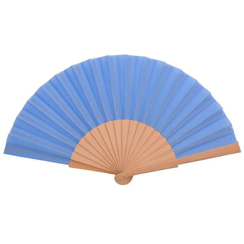 Ladies folding hand fan made of airy material with intricate folds Bowlift