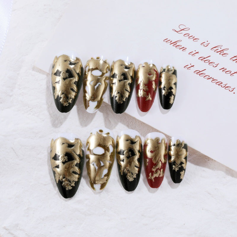 Elegant artificial nails with gold and black pattern Bowlift