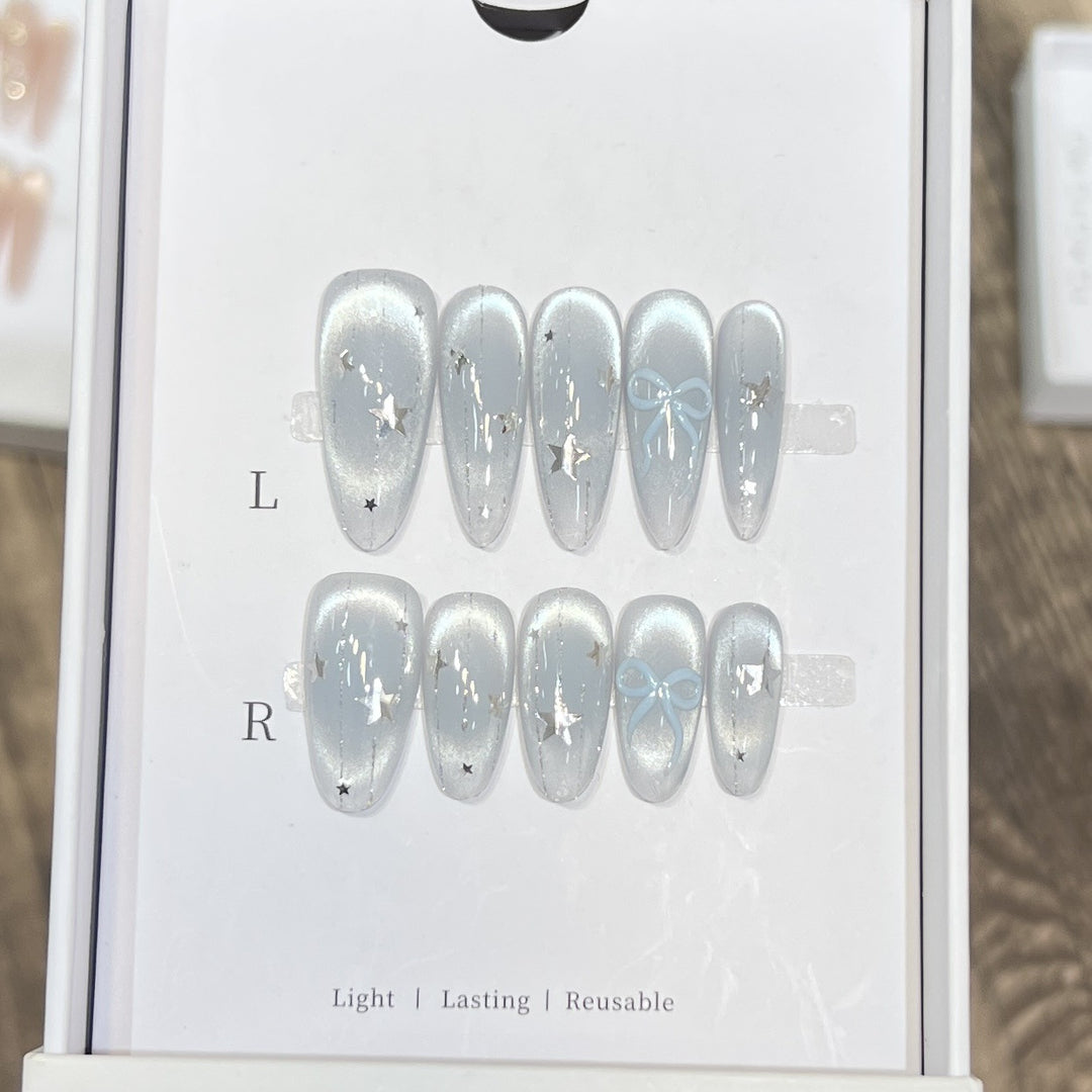 Decorative Stiletto Press-On Nail Set with Star and Bow Accents Bowlift
