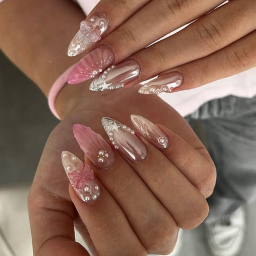 Artful stiletto nails with floral and glitter accents Bowlift