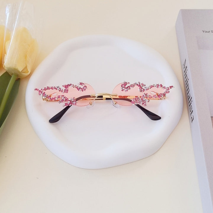 Women's extravagant design sunglasses with sparkling embellishments Bowlift