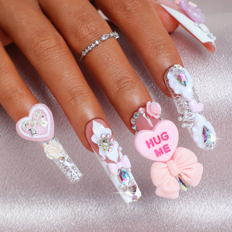 Creative nail art set with playful animal and heart motifs Bowlift