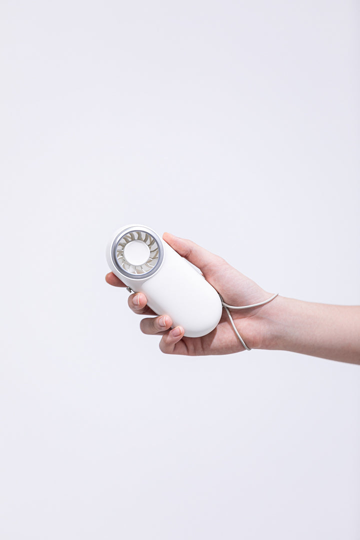 Unisex nan compact rechargeable handheld fan with ergonomic grip and carrying strap Bowlift