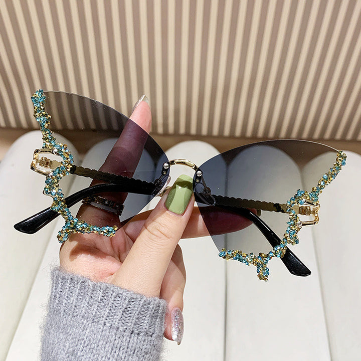 Women's extravagant sunglasses with sparkling butterfly design Bowlift