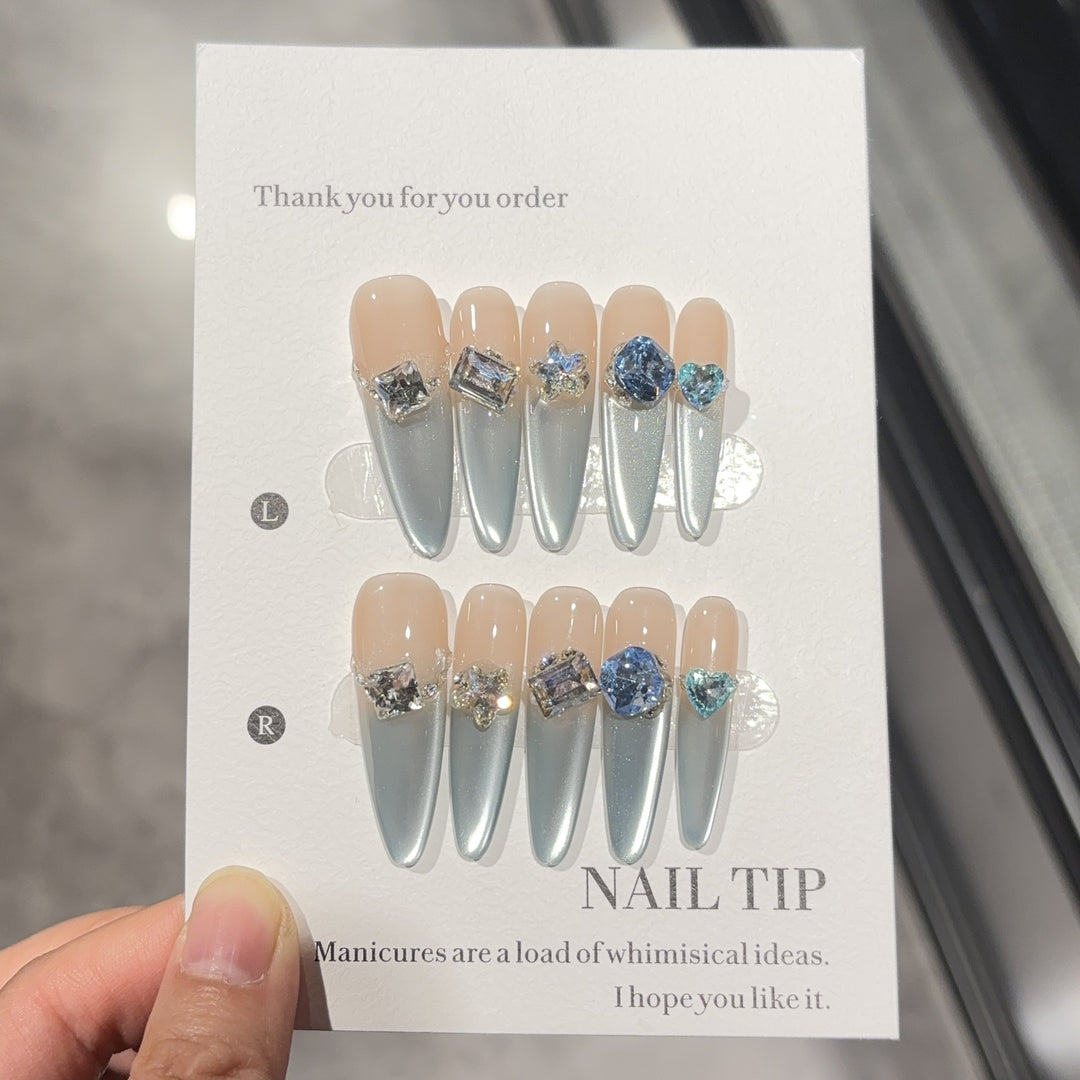 Glamorous artificial nails with sparkling stones Bowlift