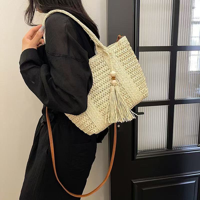Braided tote bag with tassels and leather details Bowlift