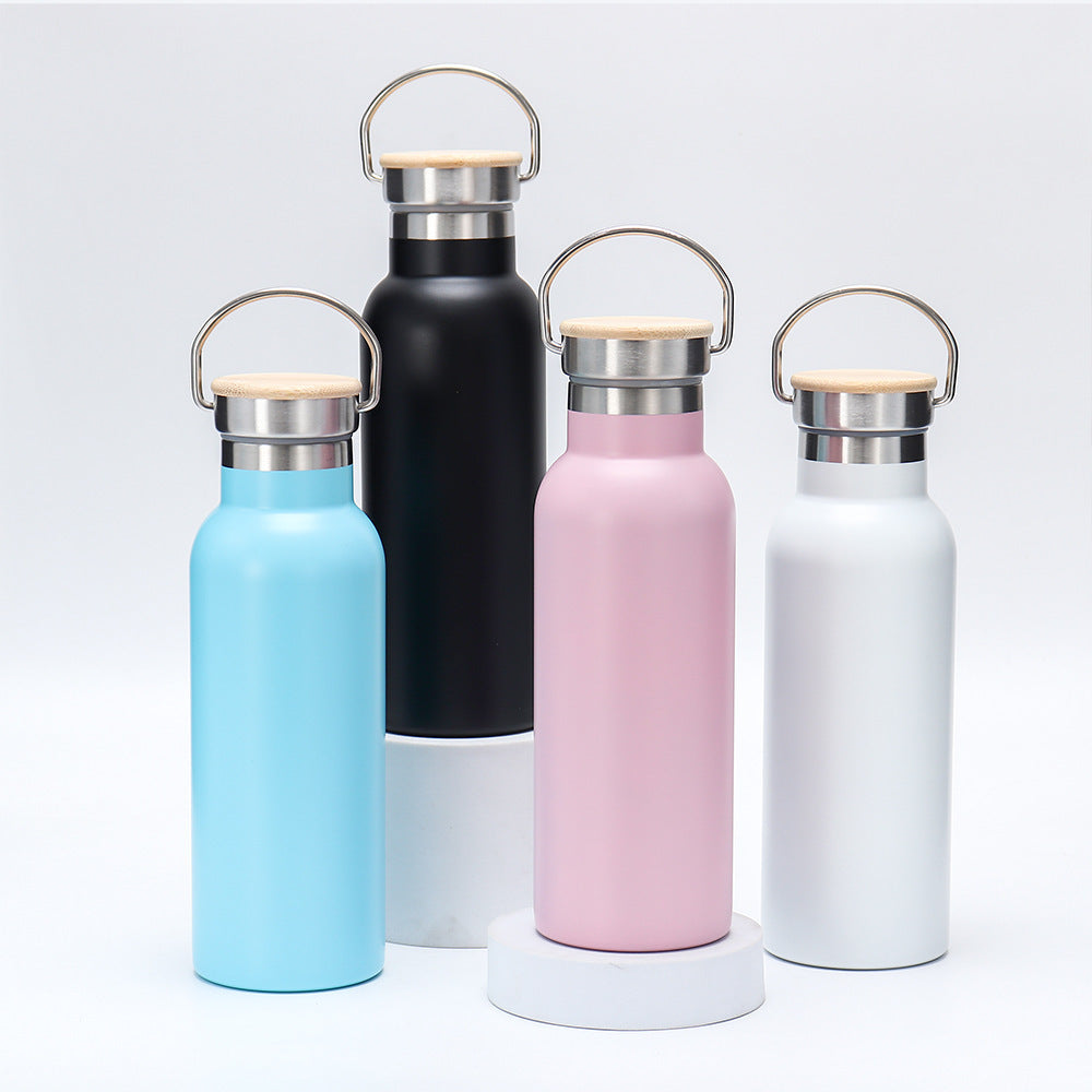 Women's insulated stainless steel drinking bottle with wooden lid Bowlift