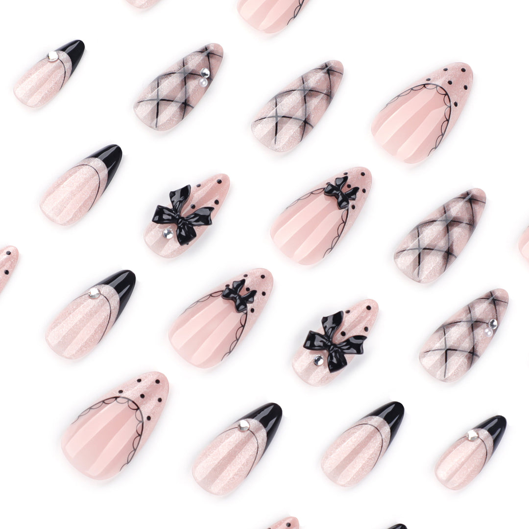 Artful Nail Art with Bow and Rhinestone Decorations Bowlift