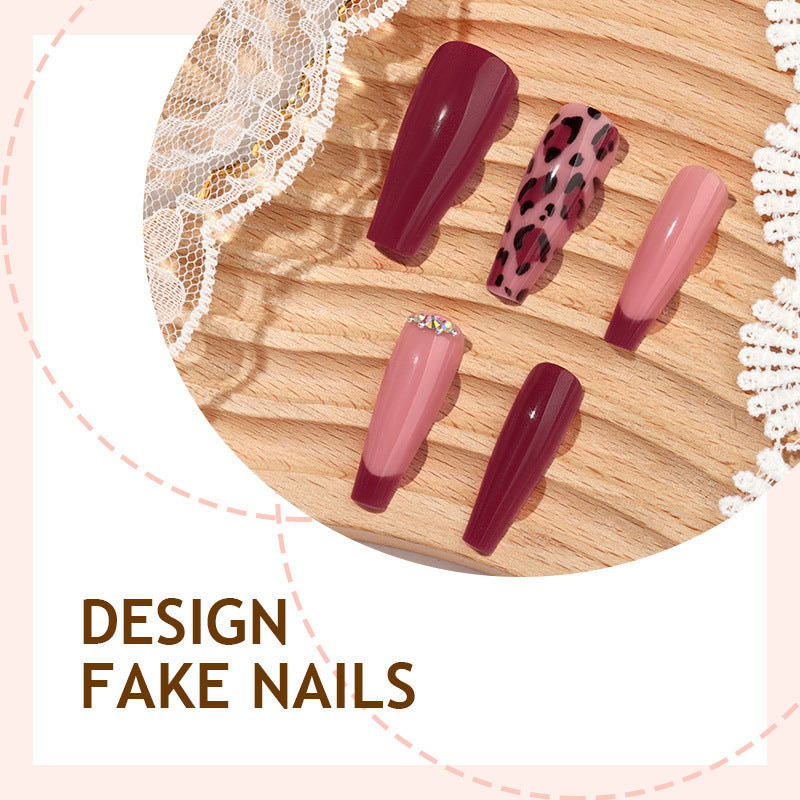 Artificial nail set with elegant animal print and glitter accents Bowlift