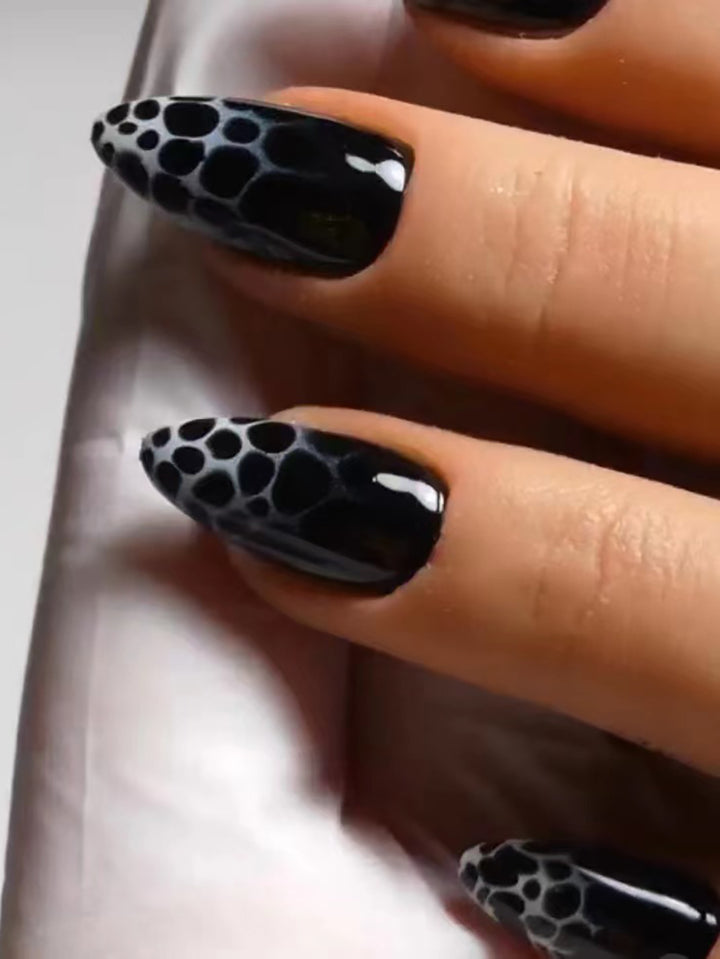 Stiletto Nail Art with Abstract Patterns Bowlift
