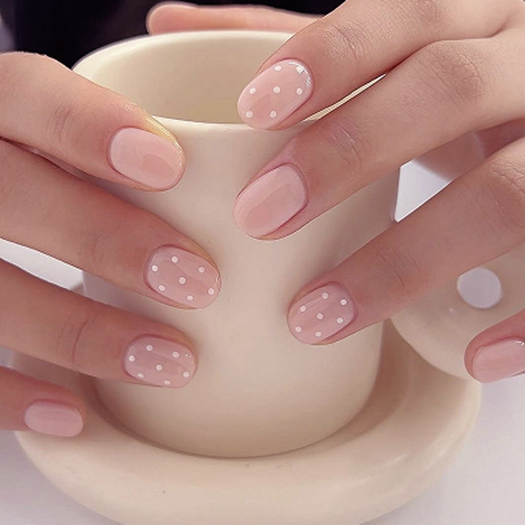 Artful stiletto nails with elegant floral design and glitter details Bowlift