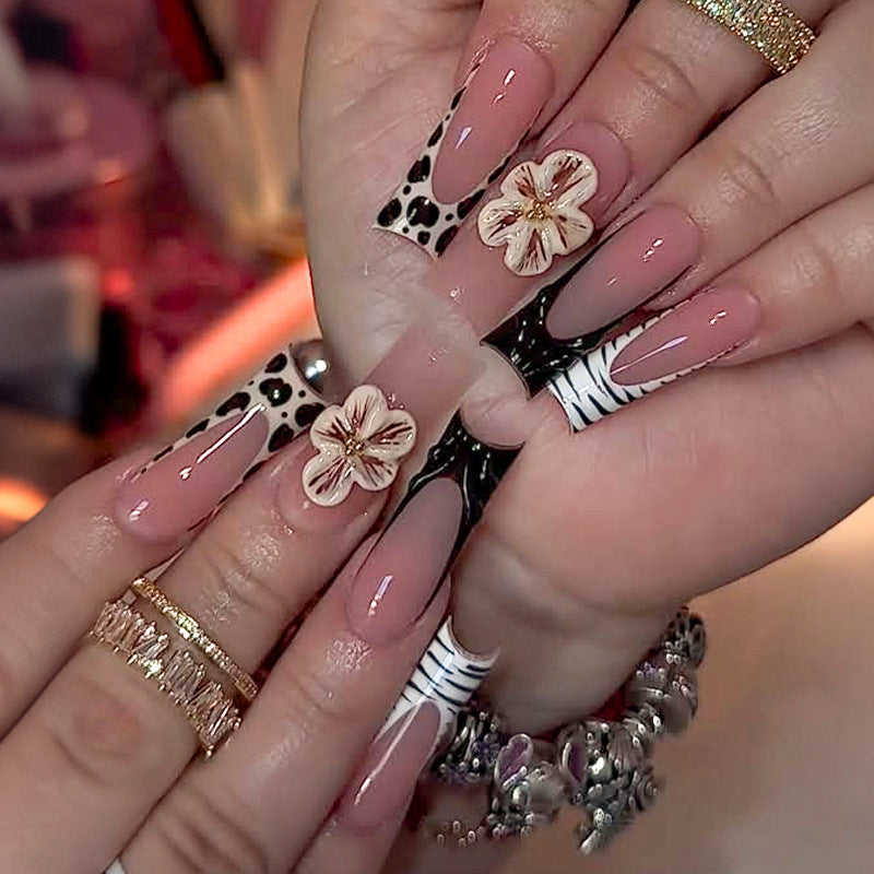 Artificial nail set with extravagant flower and animal designs Bowlift