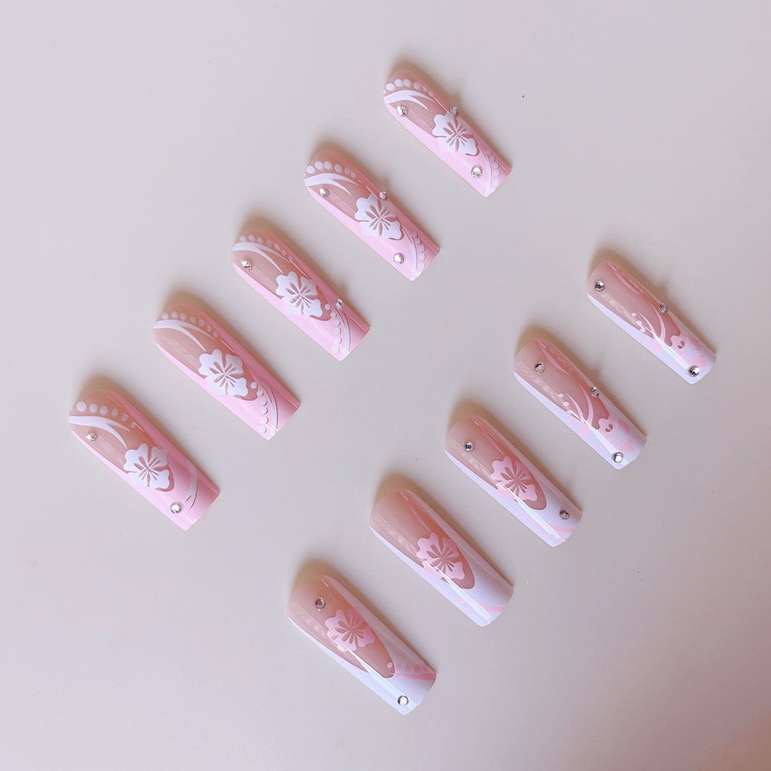 Art nail set with elegant flower design and crystal embellishments Bowlift