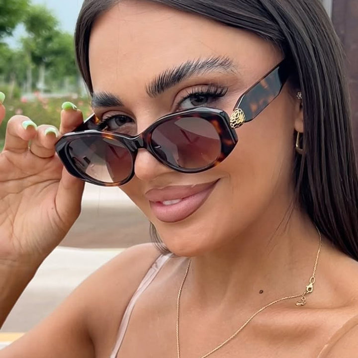 Women elegant sunglasses with stylish contours Bowlift