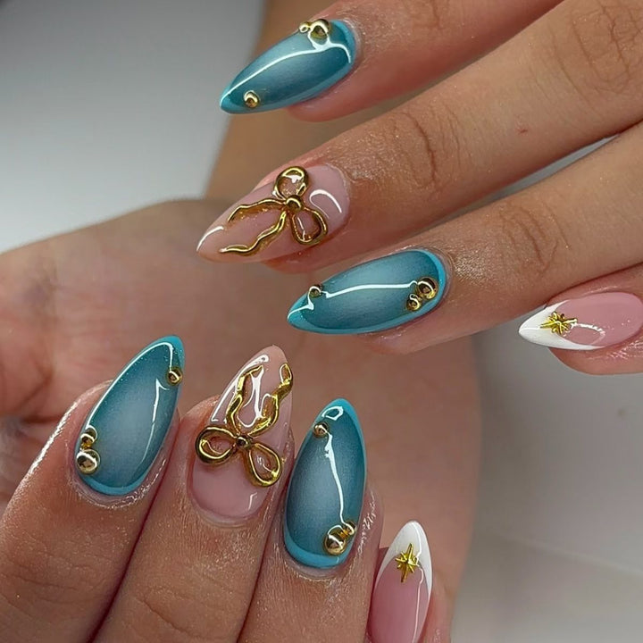 Artistic Stiletto Nail Art Set with Gold Accents Bowlift