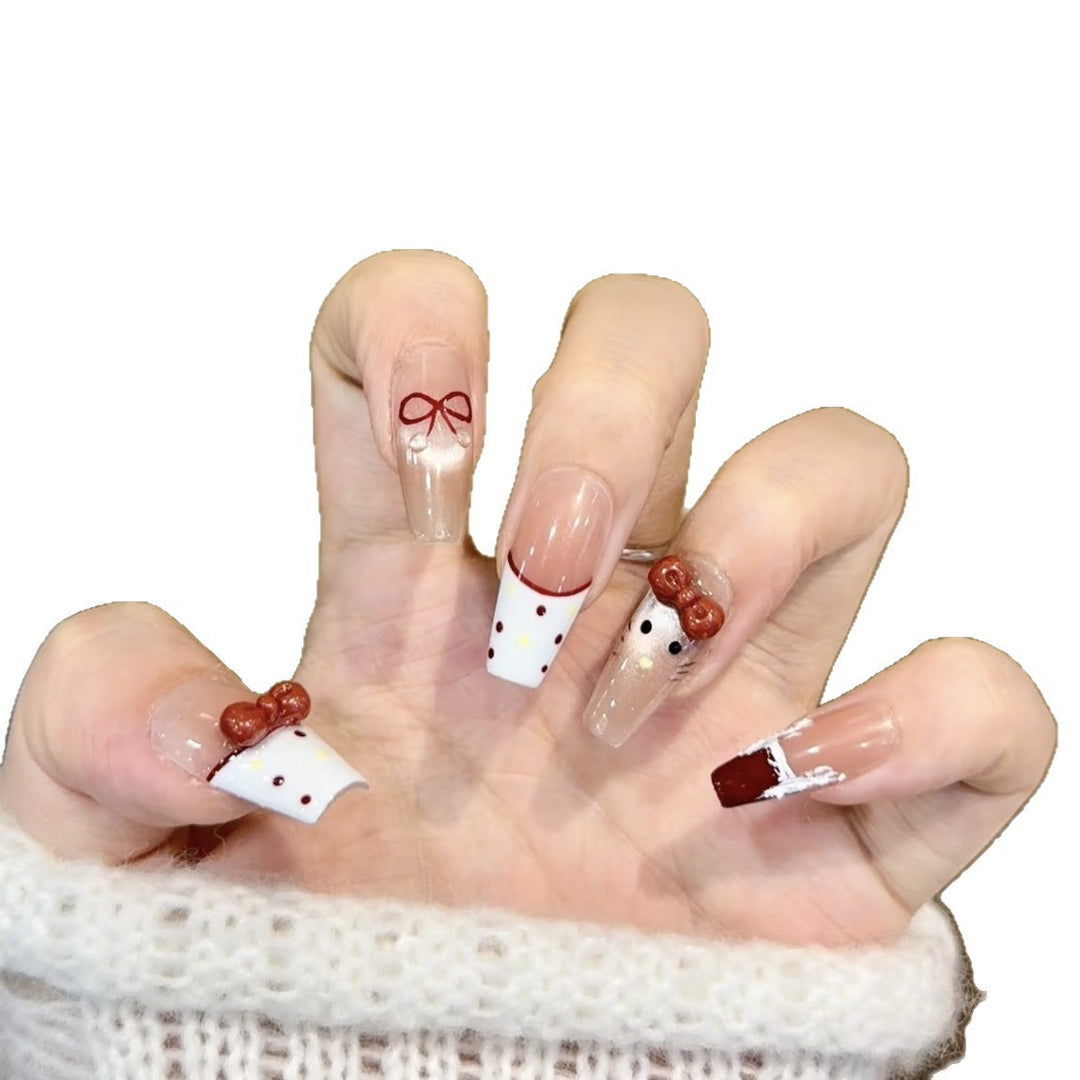 Artistic Press-On Nail Set with Whimsical Holiday Designs Bowlift