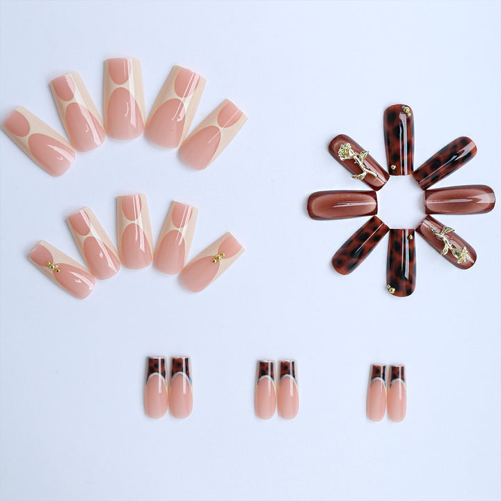 Artificial nails with luxurious embellishments and animalistic design Bowlift