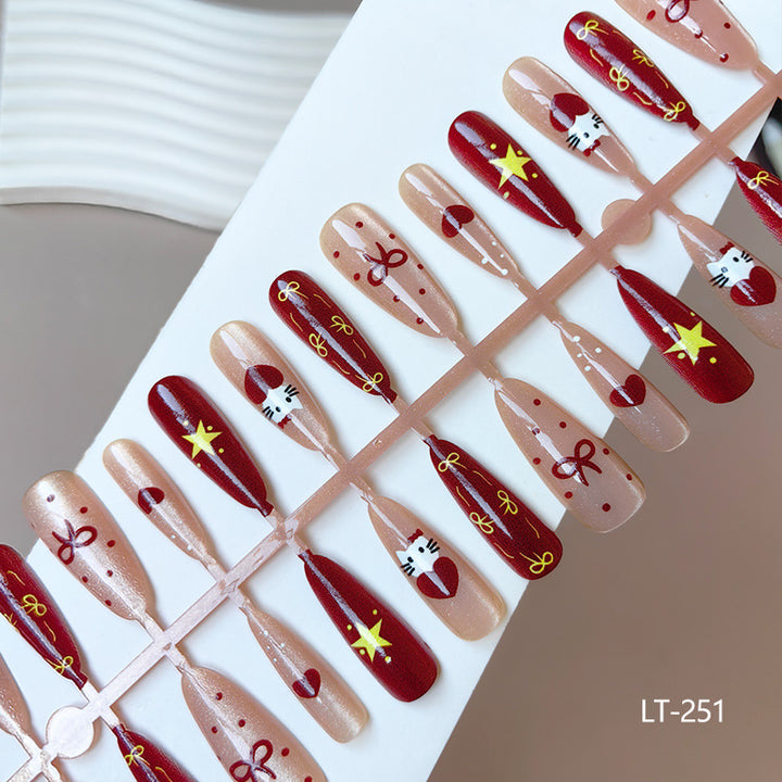 Artificial nails in festive Christmas design Bowlift