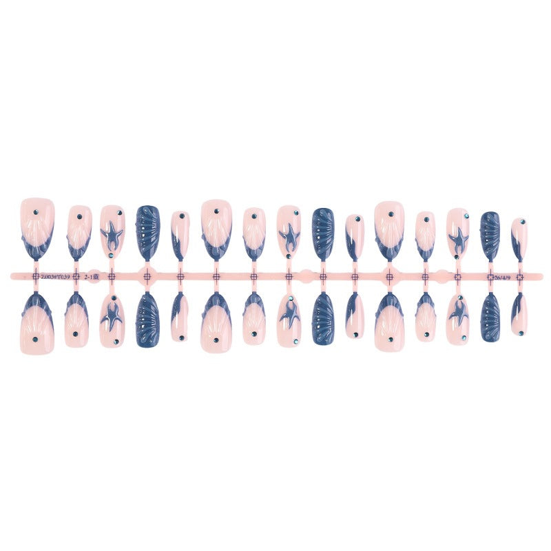 Artificial nail set with maritime shell and star motif Bowlift