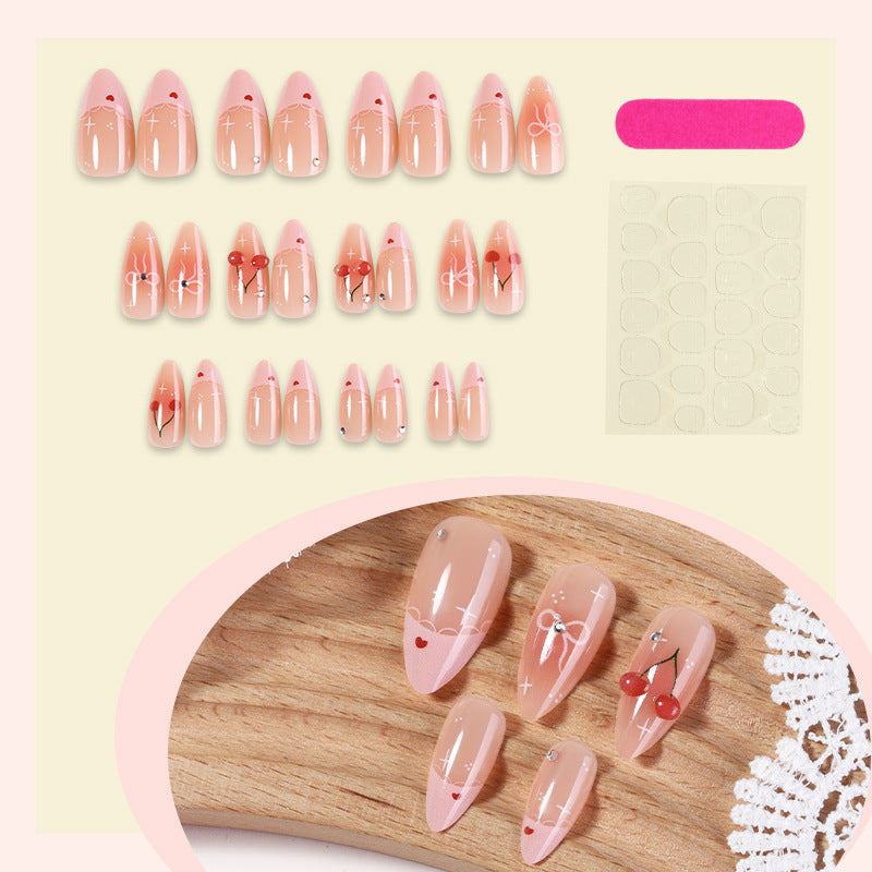 Artifical nails with playful heart and bow designs Bowlift