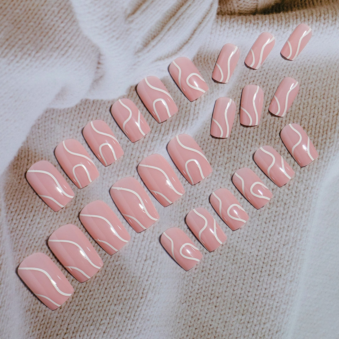 Elegant Press-On Nail Design with Artistic White Swirl Bowlift