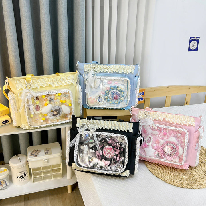 Shoulder bag with transparent front and playful applications Bowlift