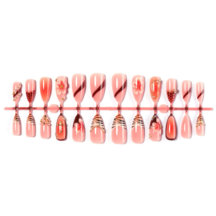 Creative nail art set with floral and glamorous accents Bowlift