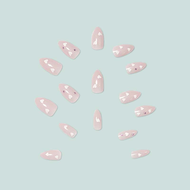 Decorative artificial nails with heart motif and rhinestones Bowlift