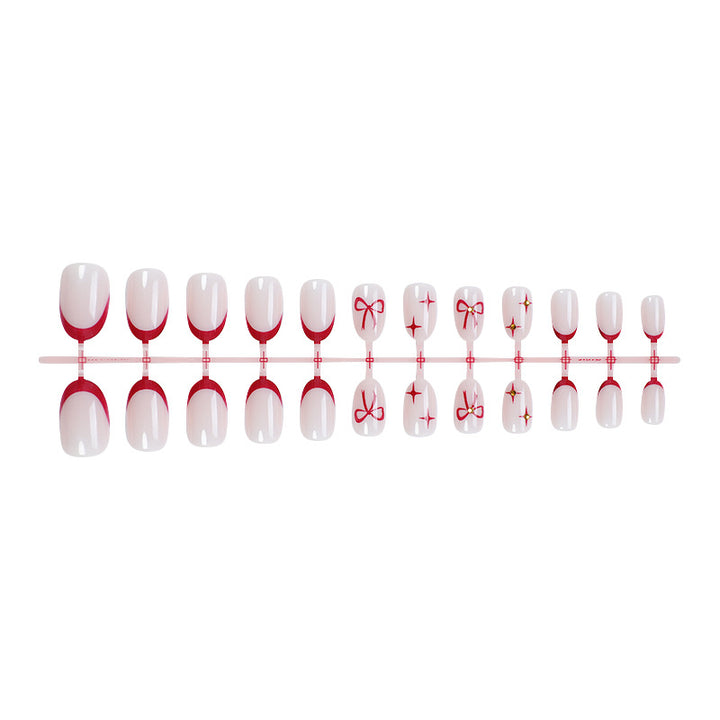Acrylic nail set with elegant arch design and glitter effects Bowlift