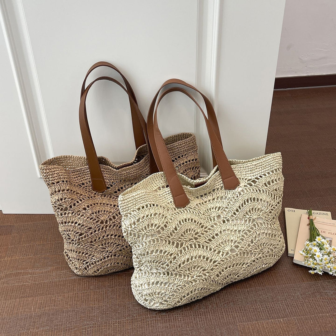 Handbag made of high-quality woven natural material with elegant leather handles Bowlift