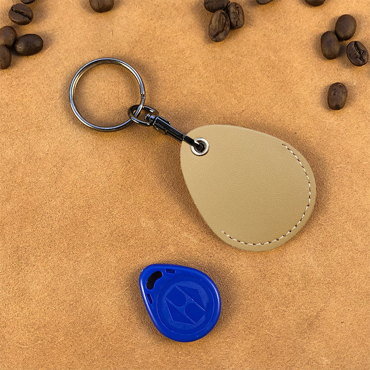 Unisex keychain with integrated Tracker Bowlift