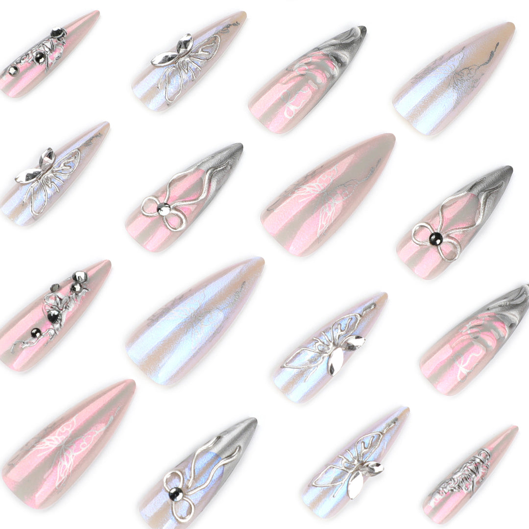 Artful stiletto nails with delicate silver casting decoration Bowlift