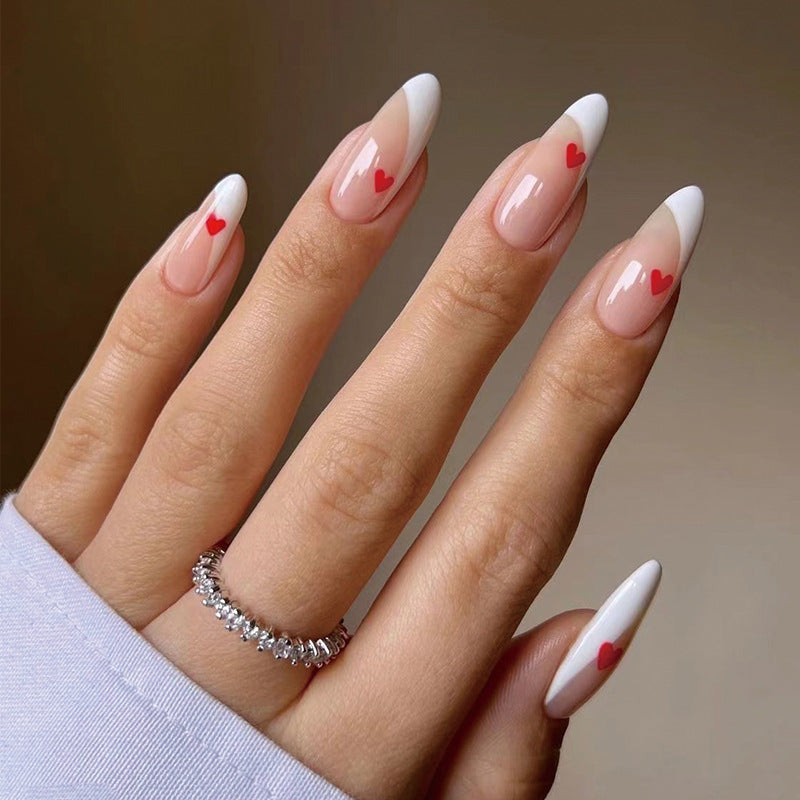 Glamorous nail art with heart decorations Bowlift