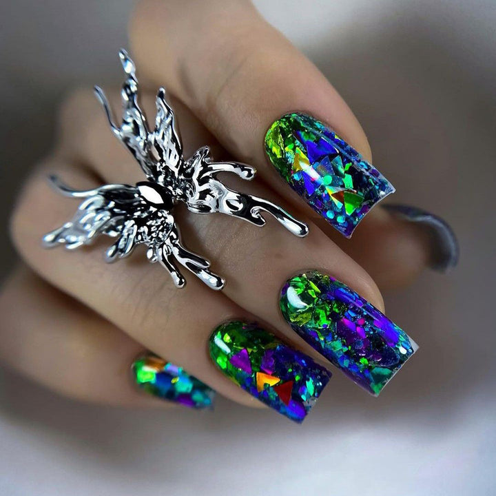 Artificial nails with sparkling glitter design and holographic accents Bowlift