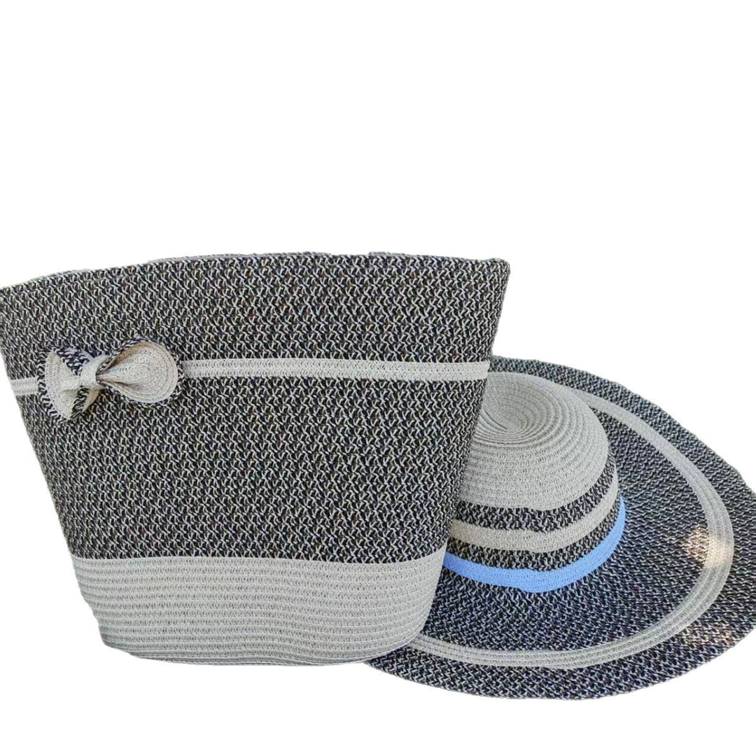 Elegant sun hat with wide brim and subtle stripe pattern Bowlift